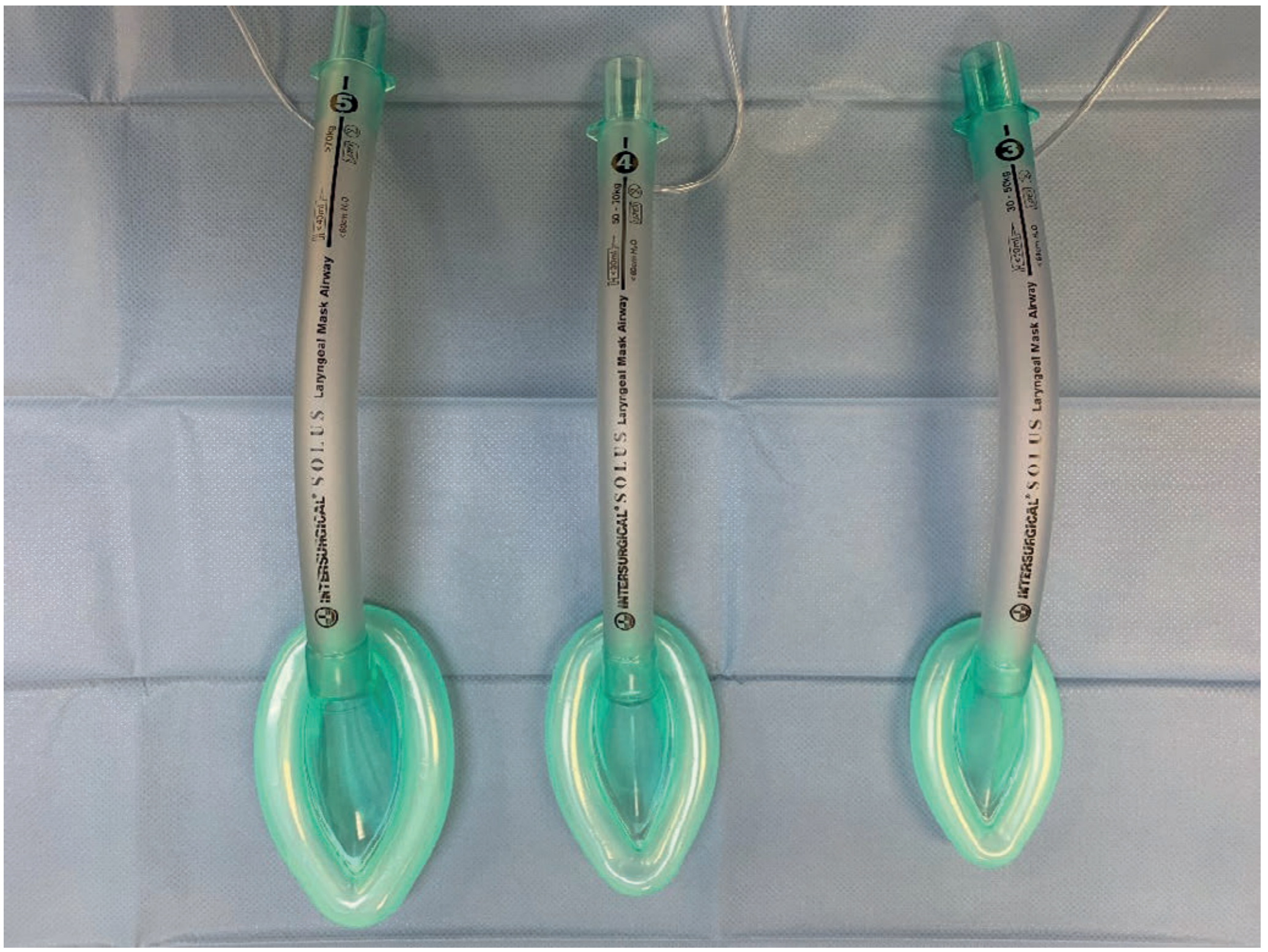 Three LMA devices (sizes 3, 4, 5) showing the inflatable elliptical cuffs used for perilaryngeal seal