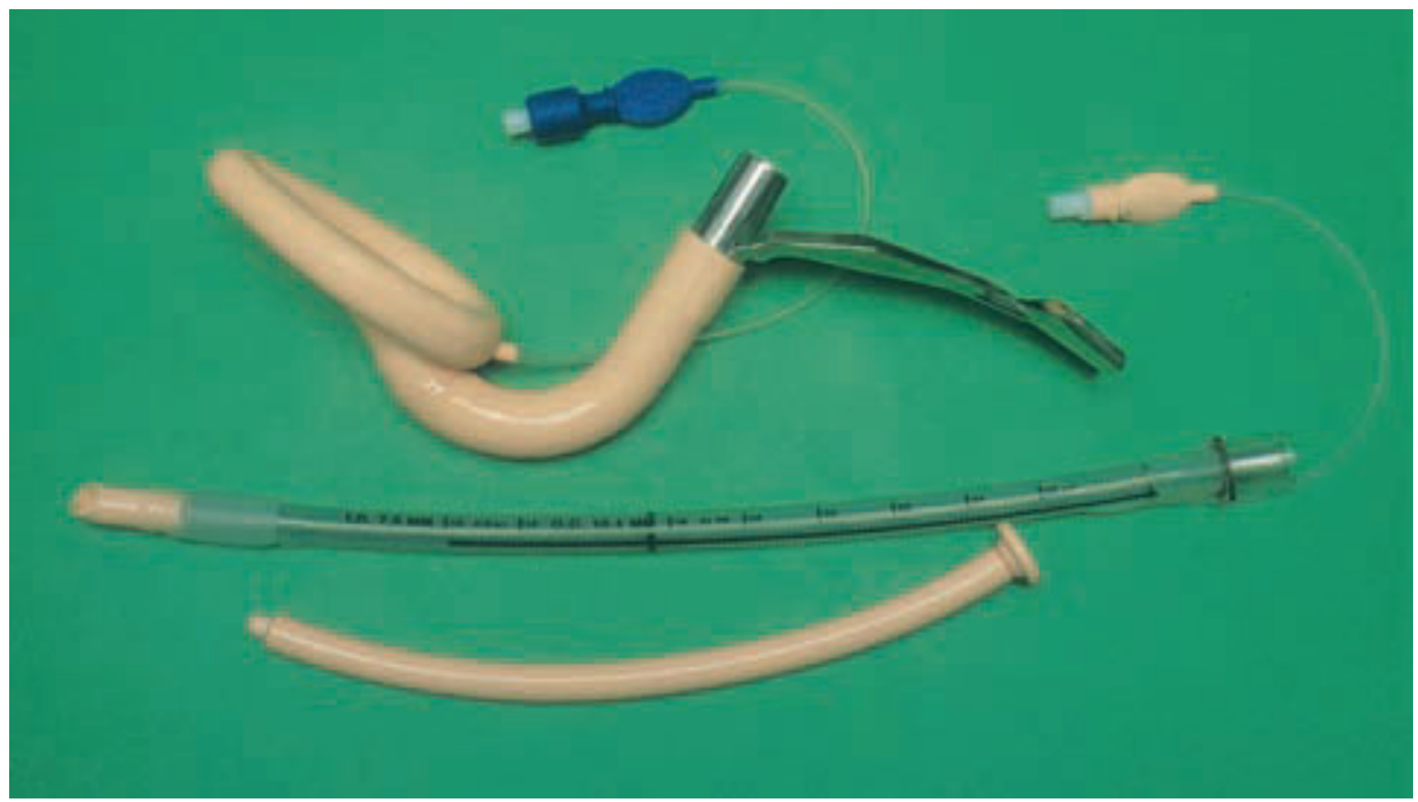 Components of the intubating laryngeal mask airway - showing the ILMA body with rigid metal handle, inflatable cuff, epiglottic elevating bar, and the specialized wire-reinforced ETT